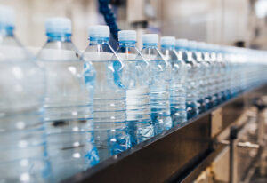 image of water bottles in production